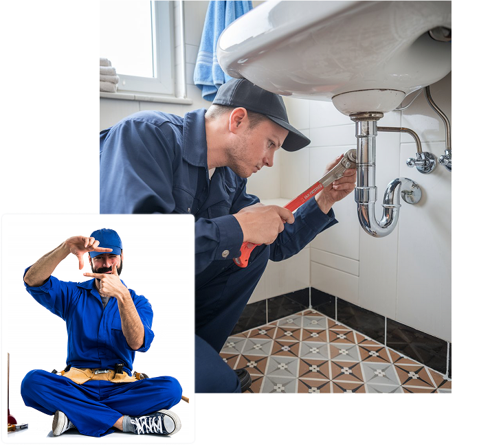 Plumber working under sink